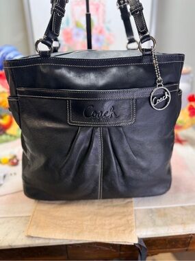 Coach Black Leather Shoulder Bag with Logo Charm
